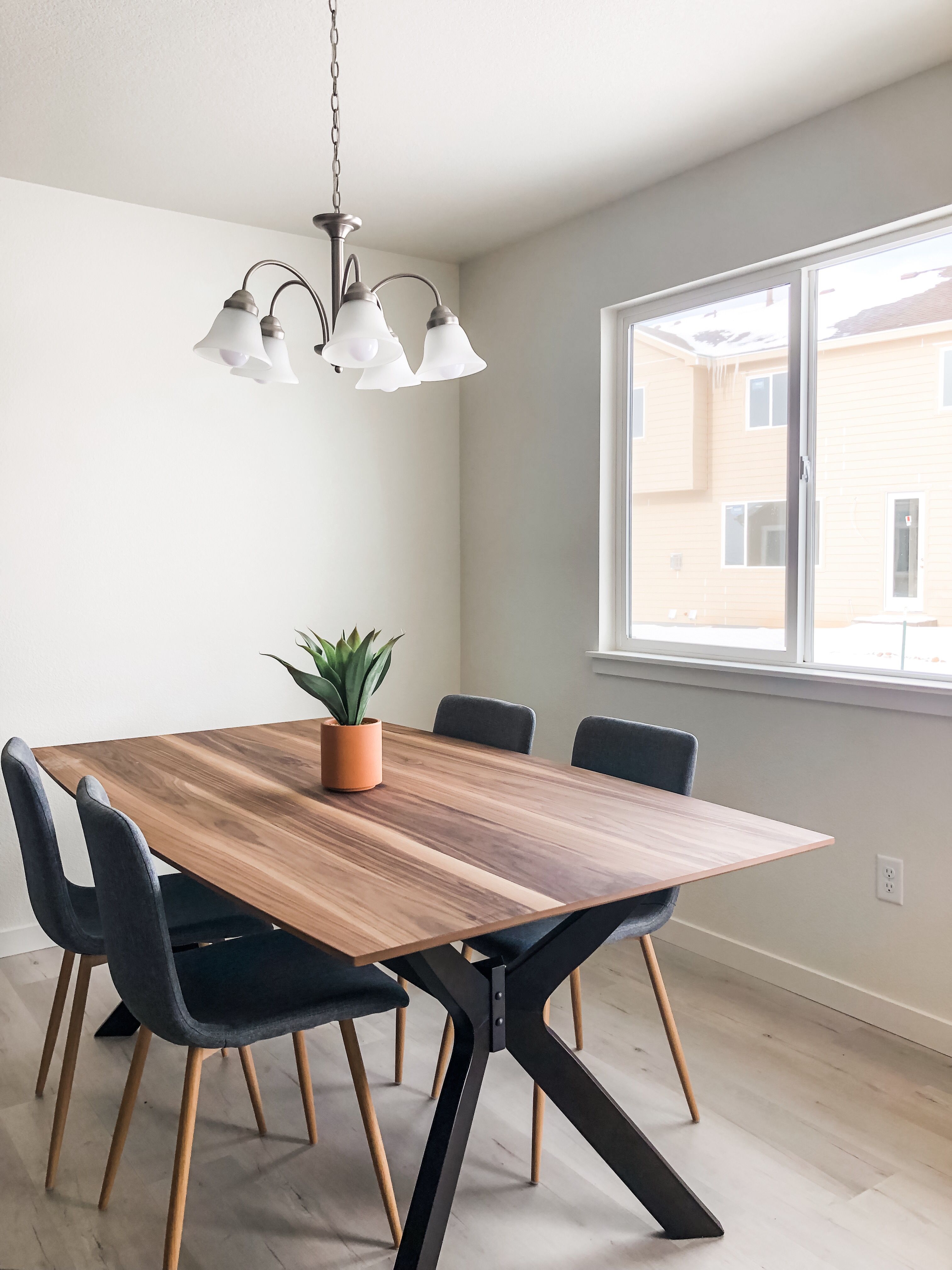 Modern bohemian style dining table. European style chairs